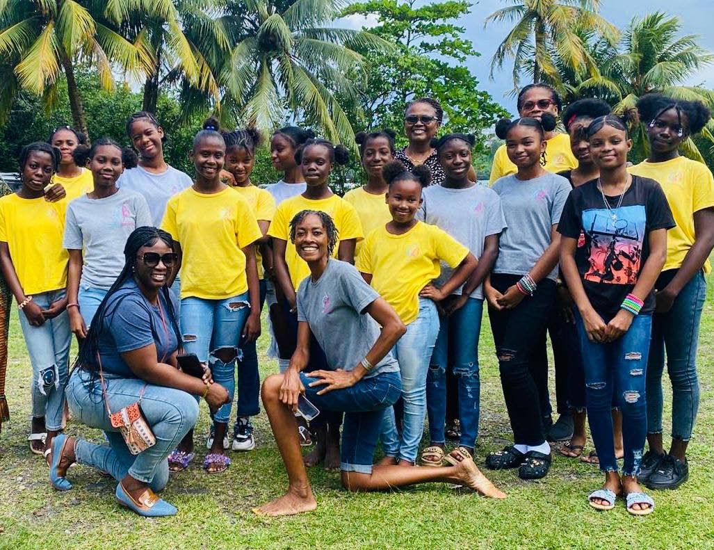 Some of the participants in the Girls Becoming Mentoring Programme with their mentors.