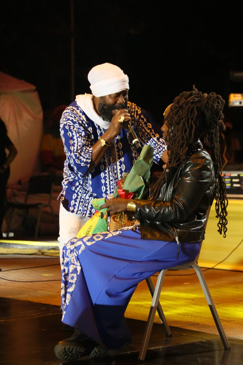 Warrior King sings to his wife, Leslie-Anne Johnson-Dyer, during his performance at the Bob Marley Tribute Concert.