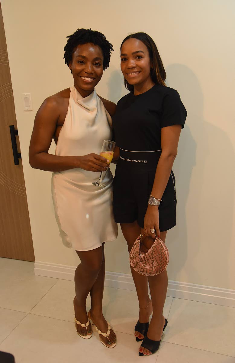 Dr Mariesha Terrelonge Lee (left), aesthetic, laser and regenerative physician, poses with Shanice Gore at the cocktail-chic affair.