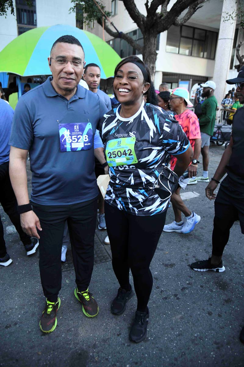 It’s all smiles from Prime Minister Dr Andrew Holness and his wife, Juliet Holness, speaker of the House of Representatives, as they gear up for the race.