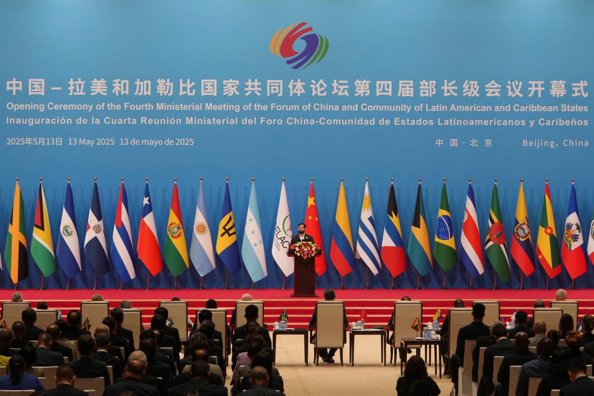 Chilean President Gabriel Boric delivers his speech on stage during the opening ceremony of the Fourth Ministerial Meeting of the Forum of China and Community of Latin American and Caribbean States at China National Convention Centre in Beijing, Tuesday, M