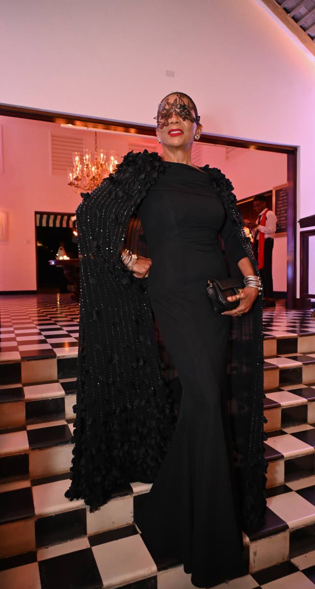 Fashionable as ever, Cecile Levee did not disappoint, wearing a black Zac Posen dress and a Karen Millen cape.