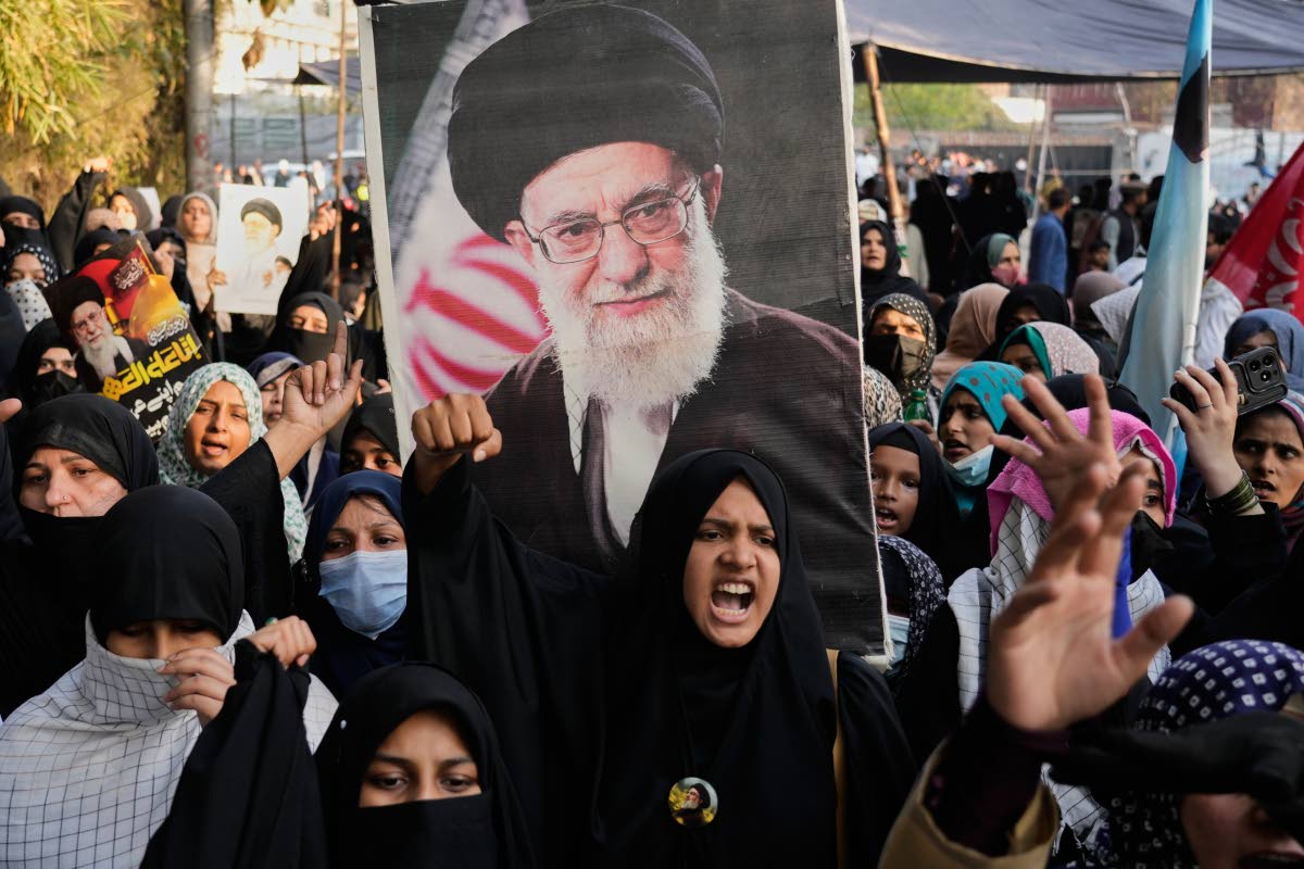 Shiite Muslims chant anti-US slogans during a rally to condemn the killing of Iranian Supreme Leader Ayatollah Ali Khamenei, in Lahore, Pakistan, on Sunday, March 1, 2026. 