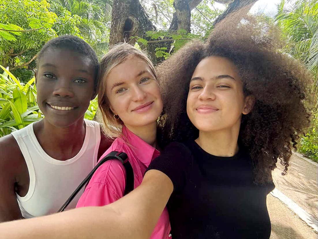 Post-shoot, photographer Patrycja Pioch-Makurat (centre) shared a snapshot with SAINT models Rihanna Messam (left) and Carolyn Sangster.