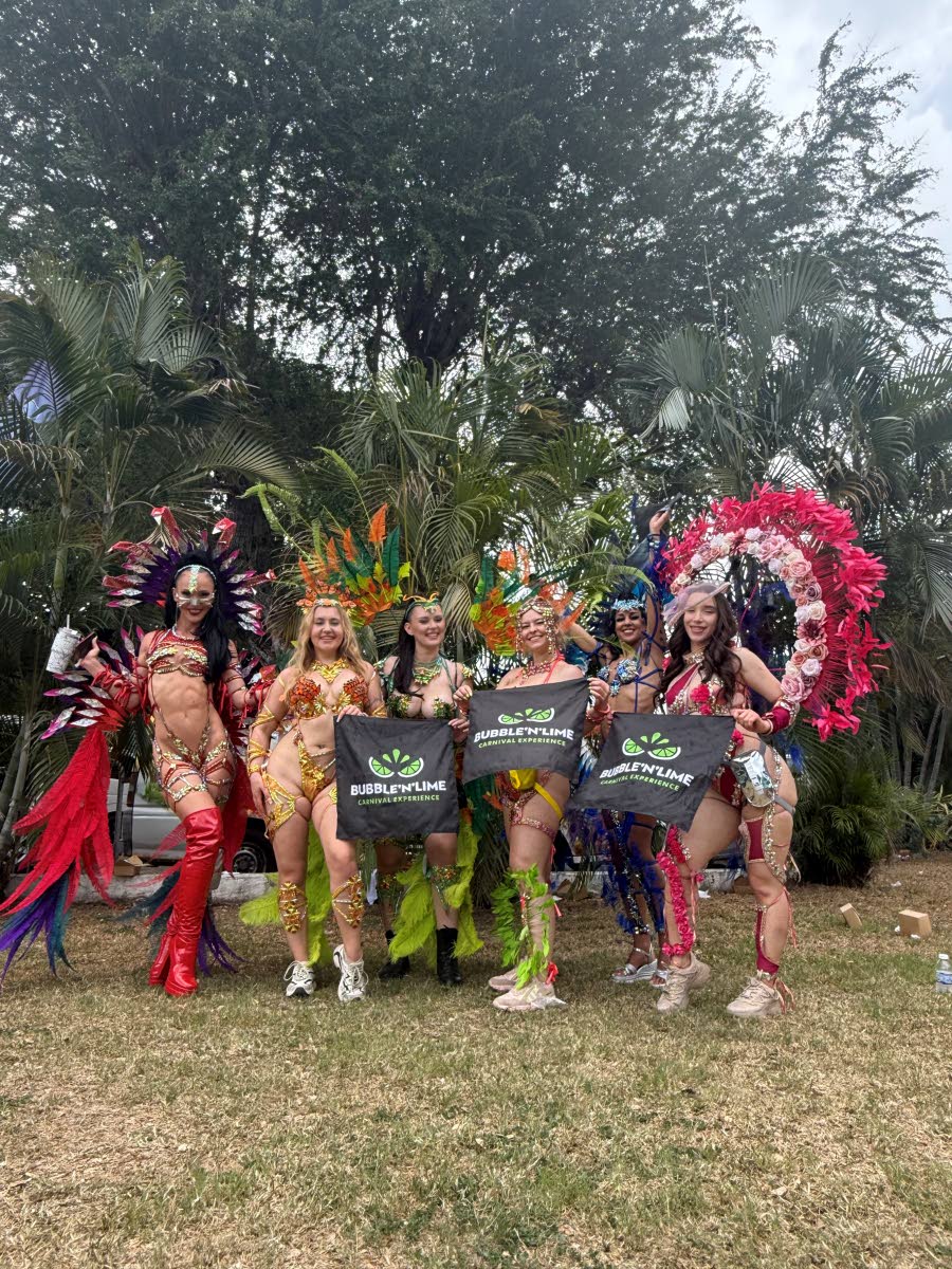 Playing mas for the first time last year with Xodus, Lavinia Laber (third left) joined her European girlfriends (from left) Agnieszka Bialon, Magdalena Gorka, Karolina Kraszewska, Sarah Tyssandier and Monika Bigos for a pre-Road March group snapshot.