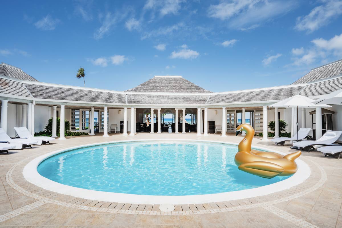 
The open-air pool, constructed on the inside, serves as both a cooling retreat and a striking design centrepiece.