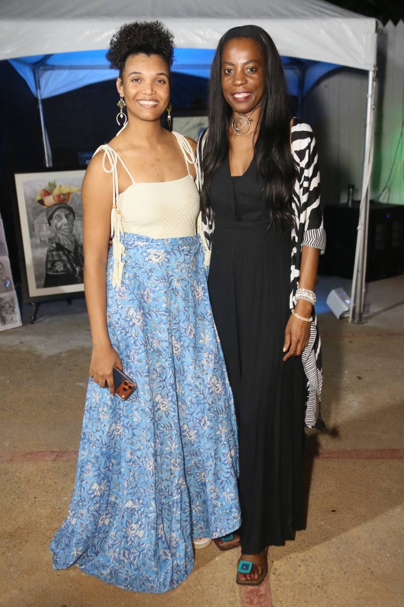 Fashion designer Ackeilia Caine (left) shared the camera lens with Melissa Preddie of Aviola Accessories, whose handcrafted pieces complemented the Island in Bloom collection.