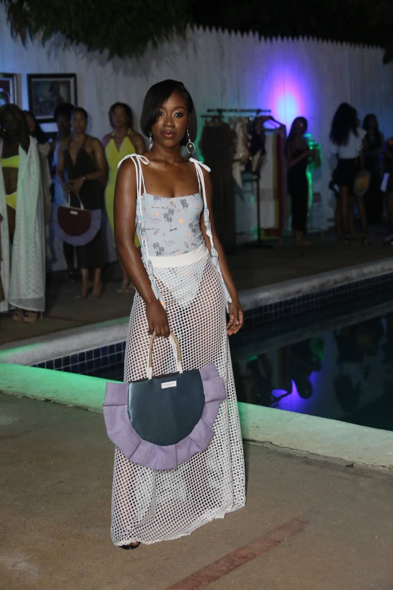 Kerrion Erskine brings the Cali palm monokini and Net Me skirt to life at Rhythm Sundays.