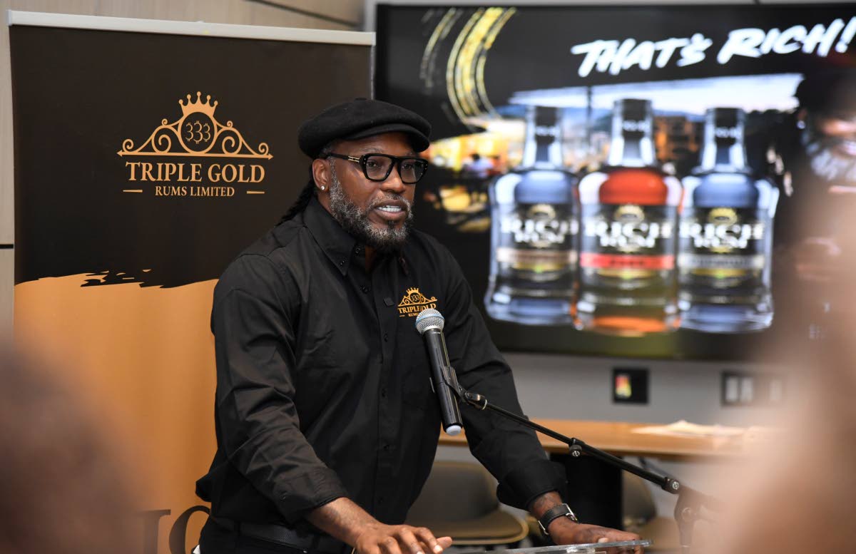 Chris Gayle brings greetings at the launch of the Triple Gold’s Rich Rum by Chris Gayle on July 8, 2026 at AC Hotel in Kingston.