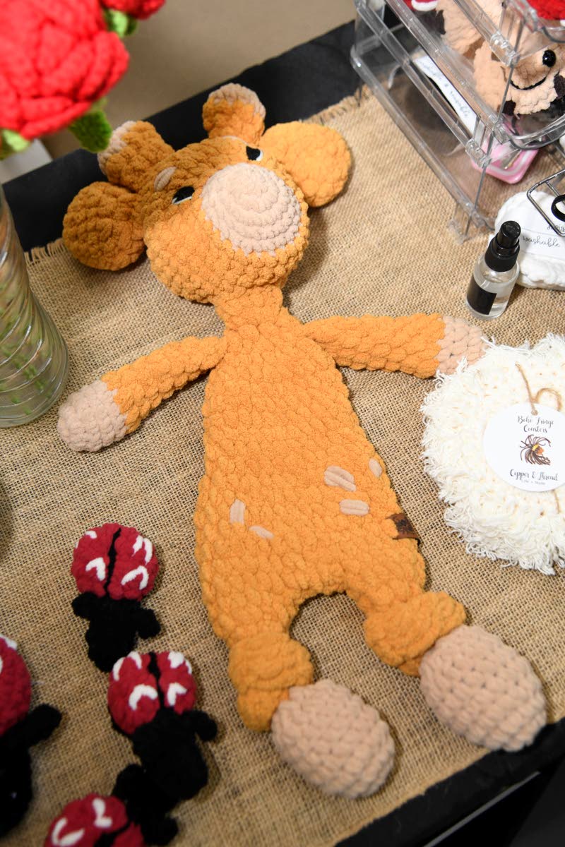 Meet the Snuggler. It is stuffed with organic cotton fibre, has embroidered eyes, and is made with the tiniest hands in mind.