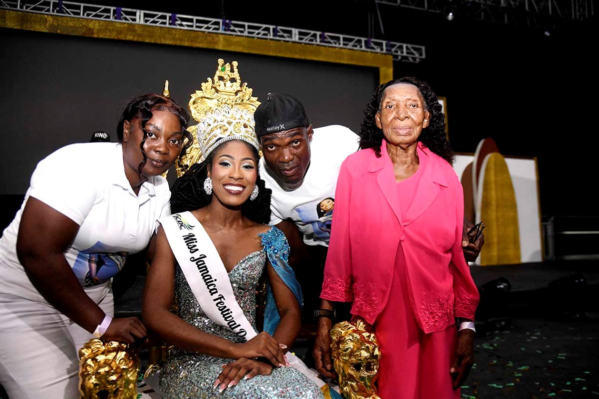 Miss Jamaica Festival Queen 2026 Christine Williams shares a moment with her family, from left, Lasandra Williams, step-mother; Conroy Williams, father and her grandmother, Carmen McPherson, at the coronation on August 1, at the Independence Village.