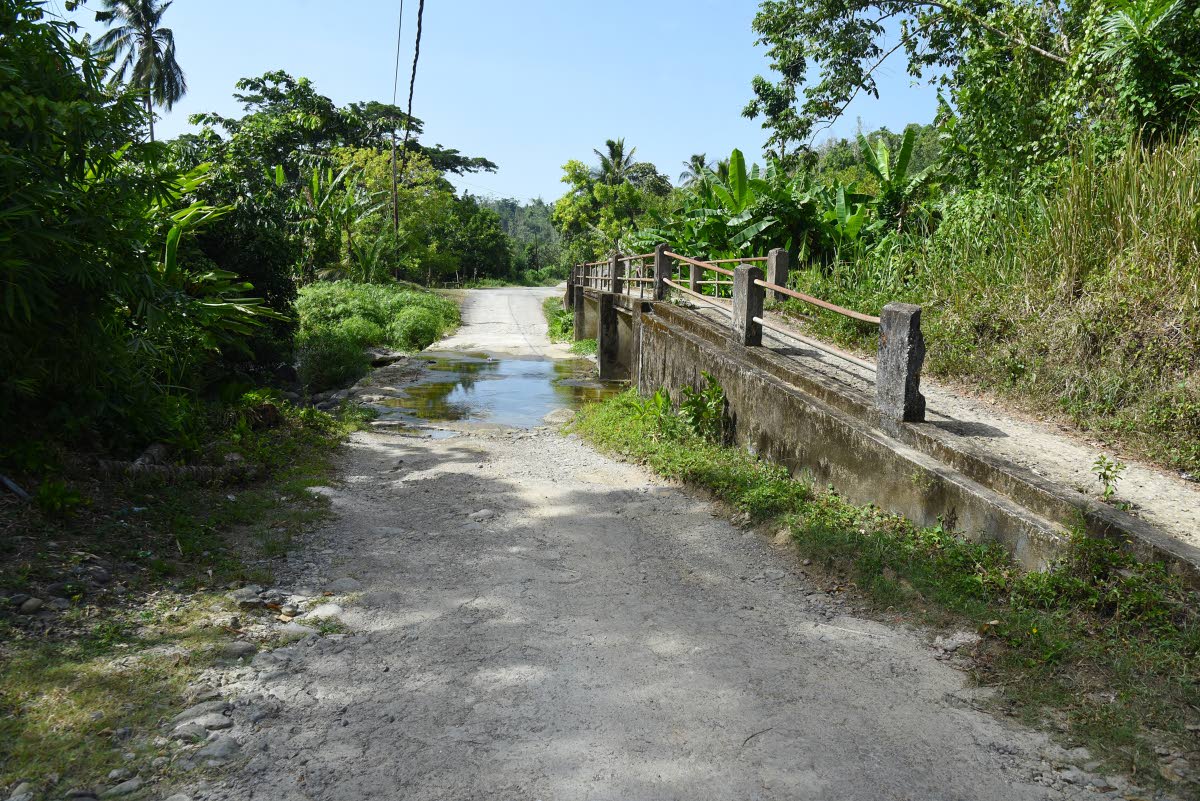 The ford and bridge at the entrance to Pleasant Hill in St Mary often become impassable when it rains heavily.