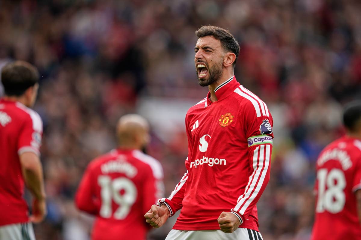 Manchester United’s Bruno Fernandes celebrates after scoring his side’s third goal during the English Premier League soccer match between Manchester United and Ipswich Town in Manchester, England, Sunday, August 30, 2026. 