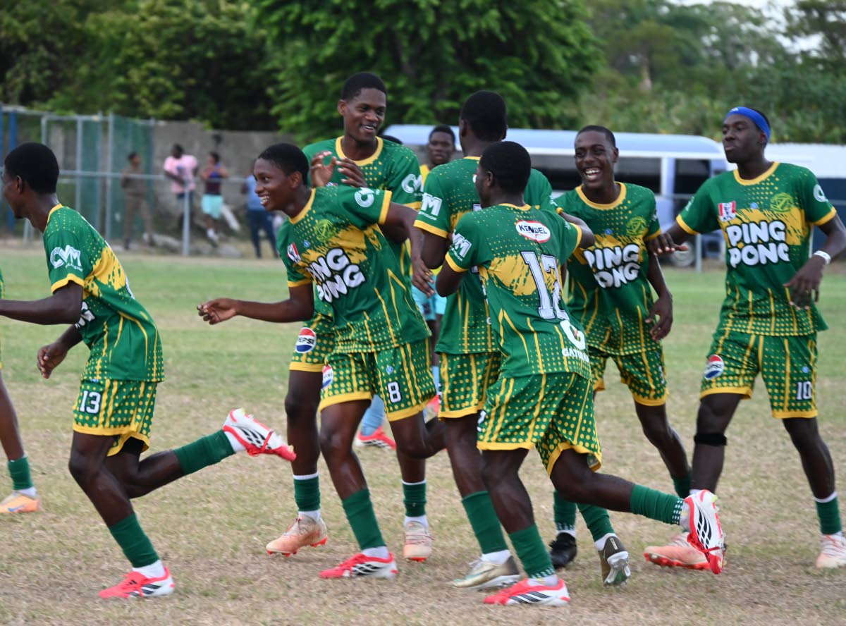 Ocho Rios High’s players celebrate after scoring a goal against Little London High during their opening match of the ISSA Ben Francis KO competition at Drax Hall Sports Complex yesterday. 