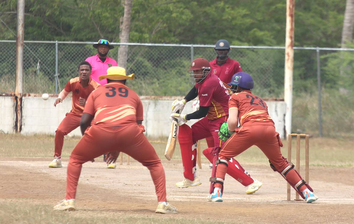 St Catherine CA batsman Rasheed Outar gathers runs on his way to a half-century during their JCA Super 50 Cup match at Port Esquivel. GC Foster wicketkeeper Romaine Bennett and bowler Javon Nembhard look on.