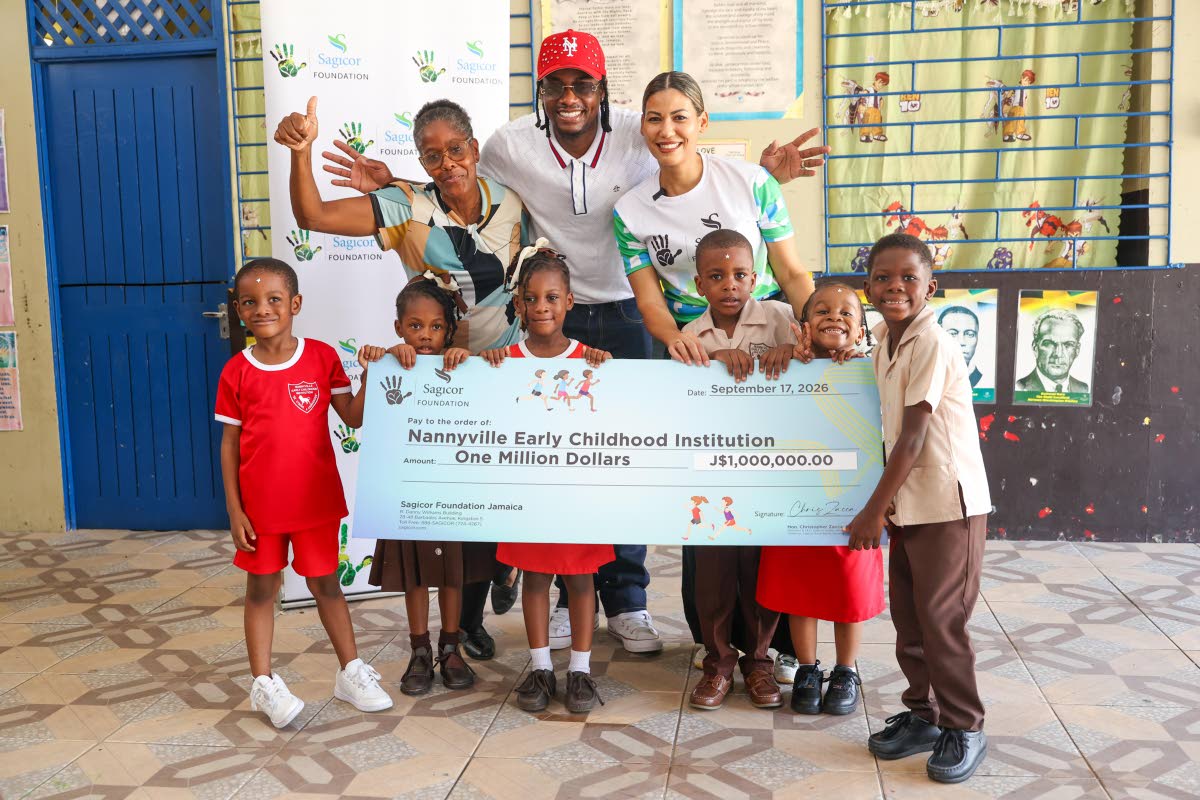 Recording artiste and 2026 Sagicor SIGMA Corporate Run patron Kemar ‘Ding Dong’ Ottey (centre) is joined by Beverley Pusey (left), principal of Nannyville Early Childhood Institution, Nicole Campbell Robinson (right), vice-president, communications, di