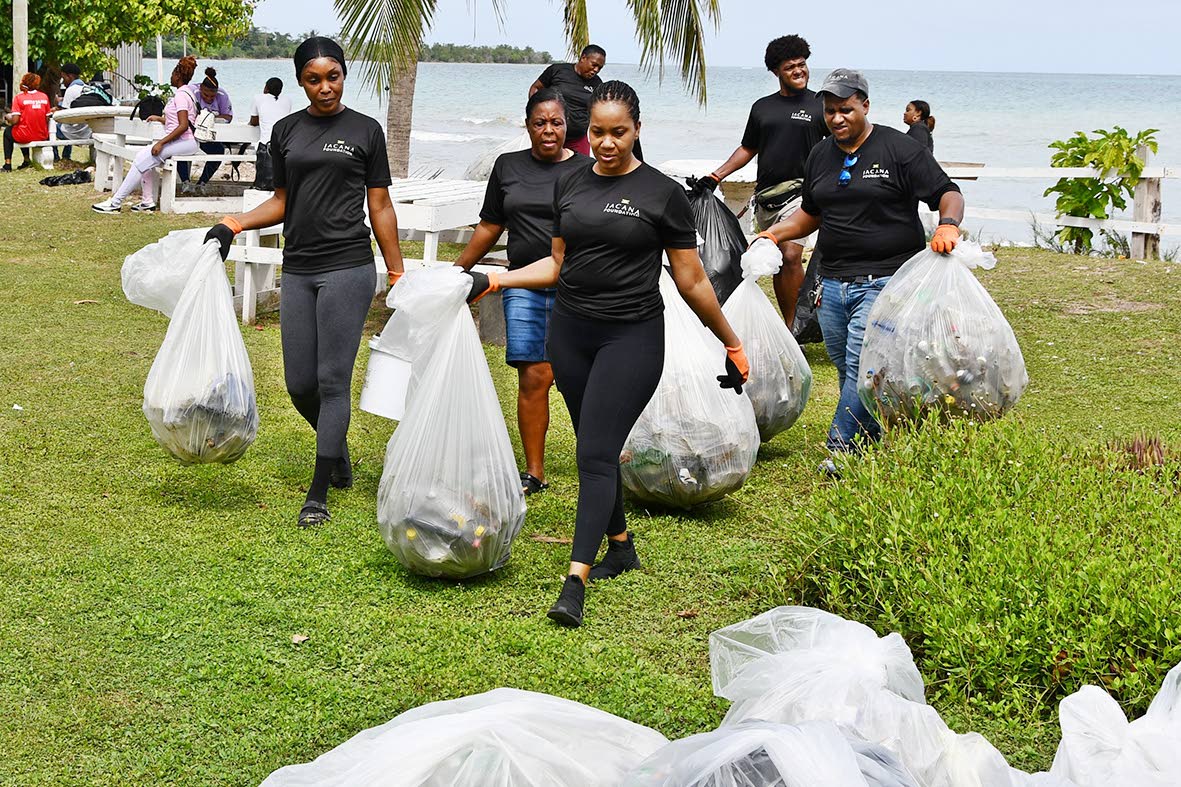 Members of the Jacana Foundation participate in the International Coastal Clean-up Day activity at Roxborough Beach in St Ann’s Bay on Saturday.