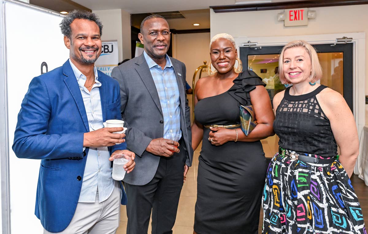 Fruit Blossoms CEO Kadeen Harvey (second right) joins JMEA executives (from left), Director Damion Dodd, Deputy President Cecil Foster and President Kathryn Silvera, for a group photo. 