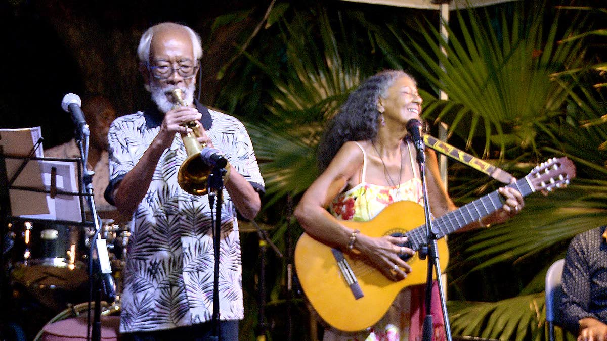 Charmaine Limonius in music heaven as she lends her vocals to several genres of music.  Accompanying her is Mickey Hanson on trumpet and other members of the band. 