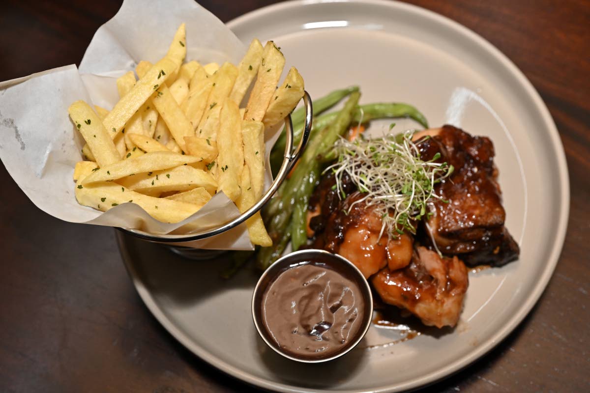 Appleton BBQ chicken is slow-baked chicken tossed in the signature Appleton barbecue sauce, finished with your side of choice and seasonal vegetables.