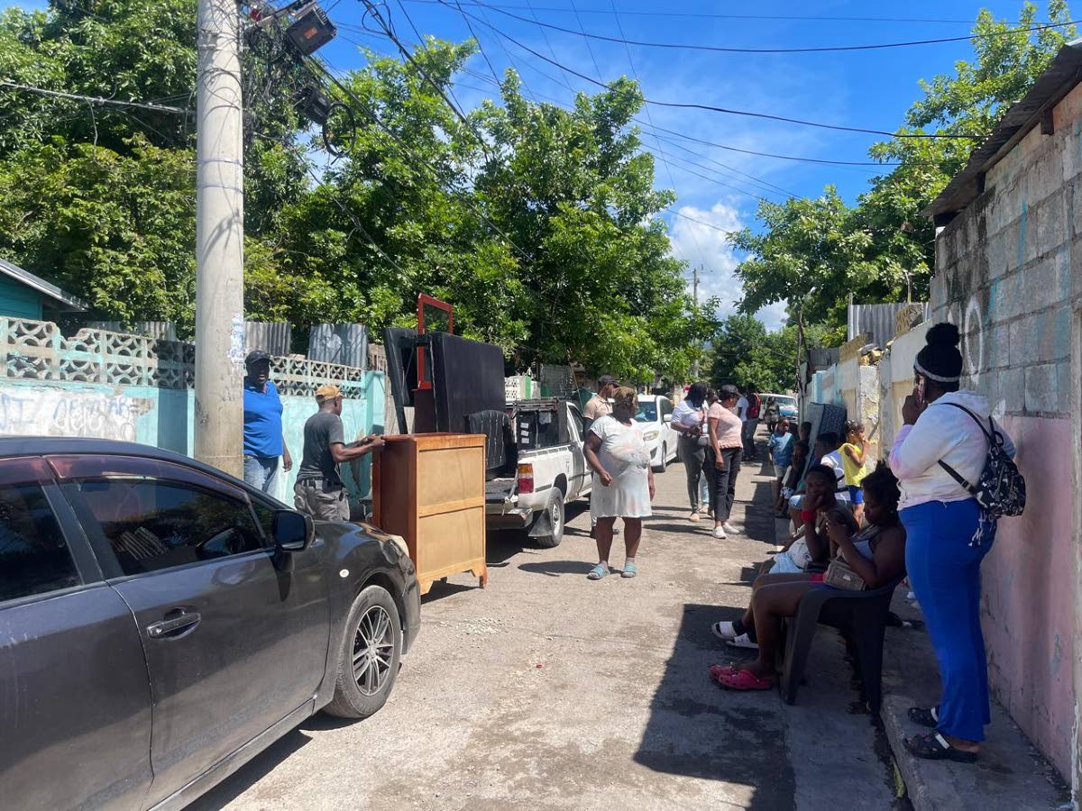 Several residents packed up their belongings to leave the community yesterday after the incident on Friday night. 