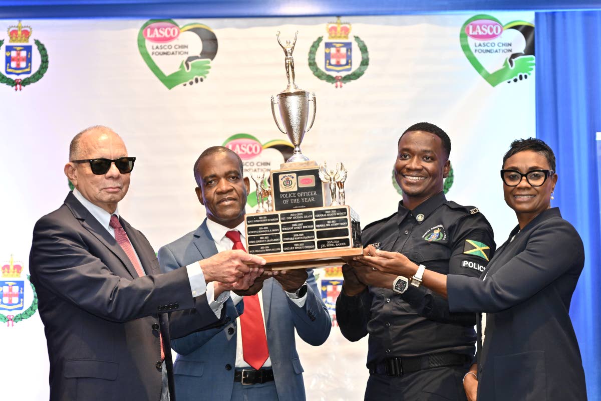 From left: James E.D. Rawle, executive chairman of LASCO Affiliated Companies; Dr Kevin Blake, commissioner of police; and Juliet Cuthbert-Flynn (right), minister of state in the Ministry of National Secutrity and Peace, present the LASCO JCF Chairman’s 