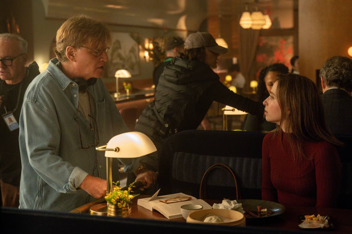 This image released by Sony Pictures shows writer-director Aaron Sorkin (left), with actor Mikey Madison on the set of ‘The Social Reckoning’. 