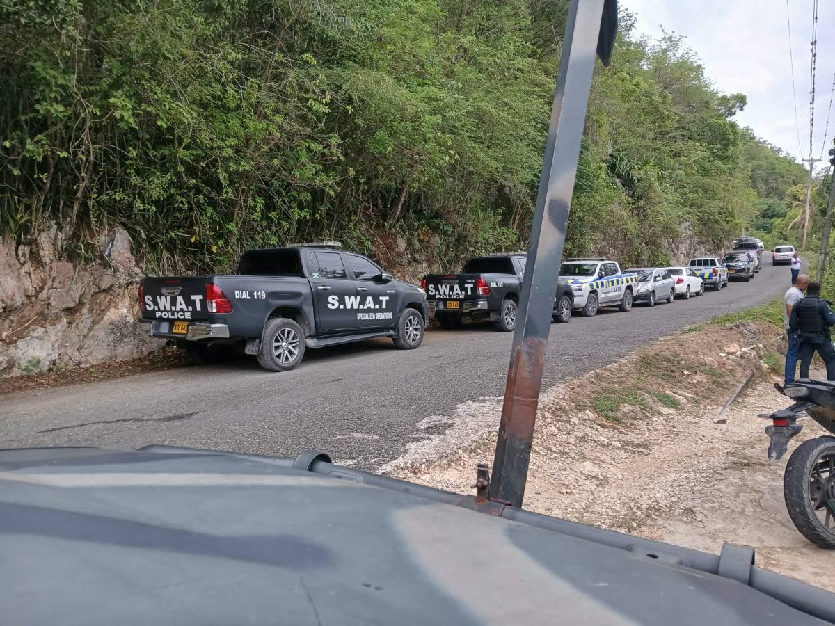 A strong police presence in Sligoville, St Catherine on October 16, 2026. 