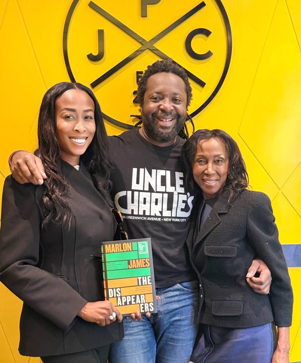 Novelist Marlon James is pictured with Anne Welsh (left), CEO of Painless Universal and Theresa Roberts, founder of Jamaica Patty Company, at his book signing at the Covent Garden eatery.