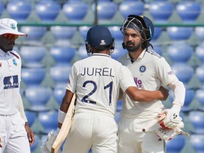 India’s wicketkeeper Dhruv Jurel (left) and KL Rahul congratulate each other after wining the second Test match against the West Indies at the Arun Jaitley Stadium in New Delhi, India, yesterday. Looking on is the West Indies’ Justin Greaves.