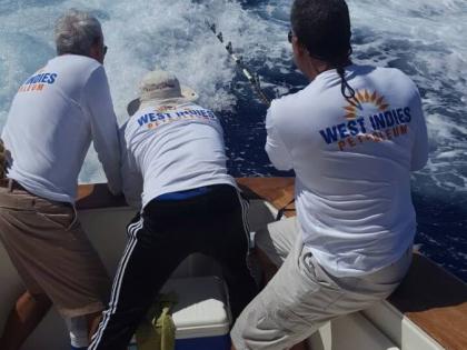 Anglers fighting a blue marlin during a previous iteration of the Port Antonio International MArlin Tournament.