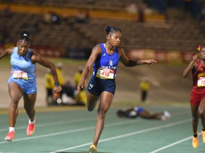 Holland High School’s Shanoya Douglas (centre) powers to victory in the girls’ Class One 100m final at the 2026 ISSA/GraceKennedy Boys and Girls’ Athletics Championships on March 25, clocking a personal best 10.98 seconds.
