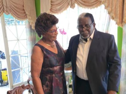 Pearnel Charles Sr with his wife Gloria at his 90th birthday party held yesterday in St Andrew. The couple have been married for 56 years and raised seven children together.