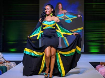 Dr Alicia Swaby Spencer embraces the spirit of Jamaica as she models a vibrant Jamaica-inspired creation during the 2026 Mrs Jamaica Universe coronation. 