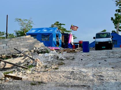 Tents erected on the ground in Coopers Pen, Trelawny, after approximately 20 houses were demolished last month.
