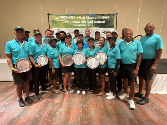 Team Jamaica poses for a photo after retaining the CGA Four-Ball Championship title in Montego Bay, Jamaica on the weekend.