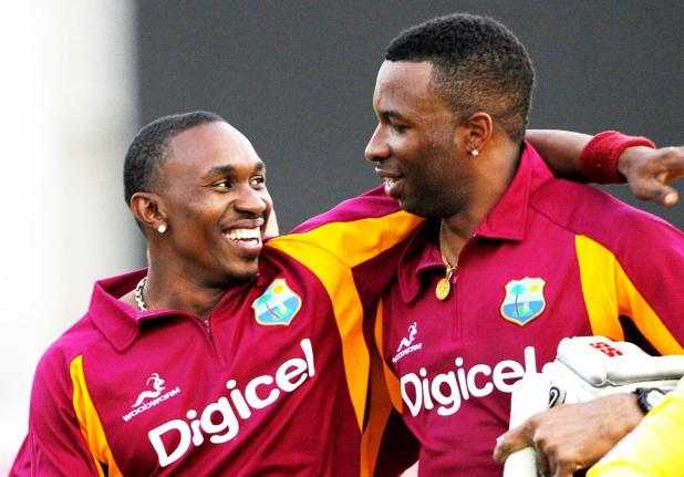 Former West Indies cricketers Kieron Pollard (right) and Dwayne Bravo.