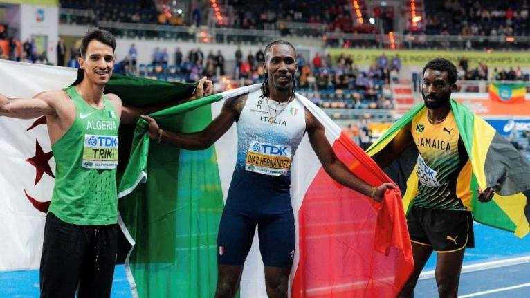 Jamaica’s Jordan Scott (right), silver medallist in the triple jump on the opening day of the 2026 World Indoor Championships, poses with gold medallist Andy Diaz Hernandez (centre) of Italy and bronze medallist Yasser Mohammed Triiki of Algeria.  
