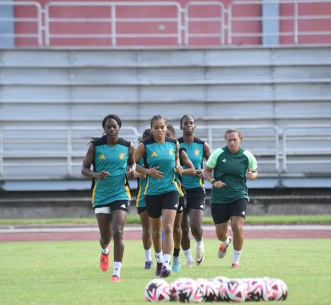 Members of Jamaica’s Reggae Girlz warm up. 