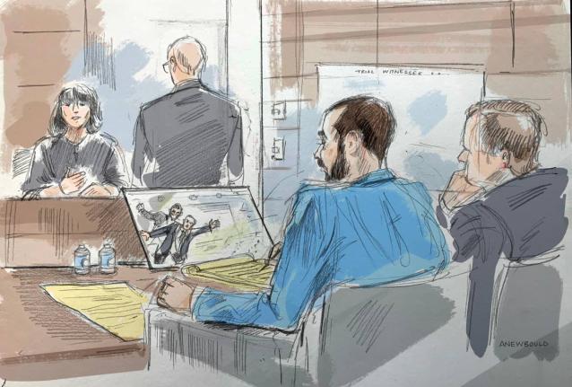 In this courtroom sketch, a witness describes video of an alleged attack on Salman Rushdie by Hadi Matar, in federal court in Buffalo, NY, on Wednesday, July 22, 2026. Matar, foreground, is seated with his lawyer’s co-council.