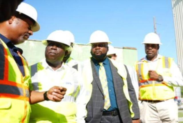 Bahamas Prime Minister Philip Davis (second from left) listens as officials from the Bahamas Power and Light (BPL) explain the situation at the Blue Hills Power Station. 